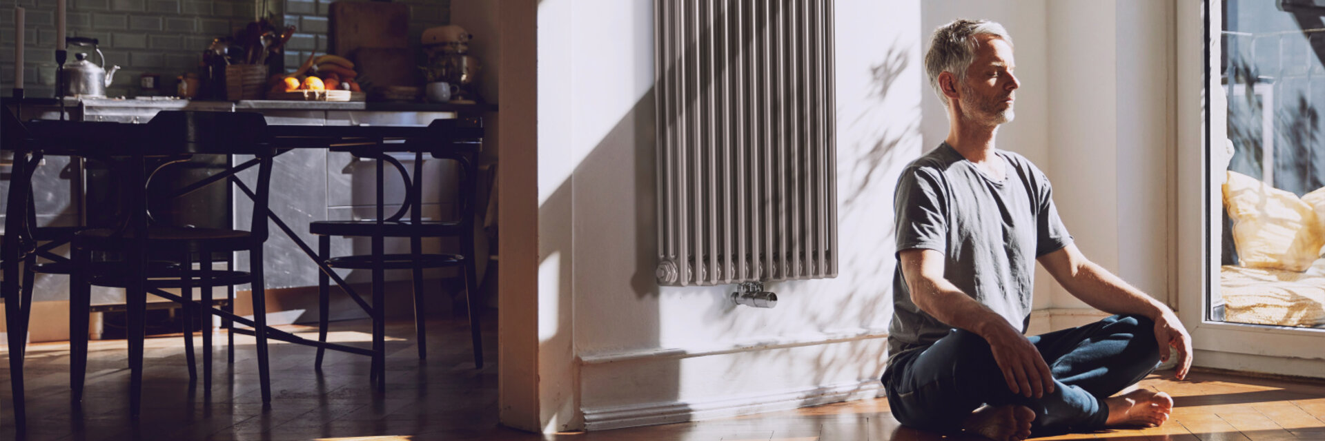 man meditates, old building flat, relaxed, charleston